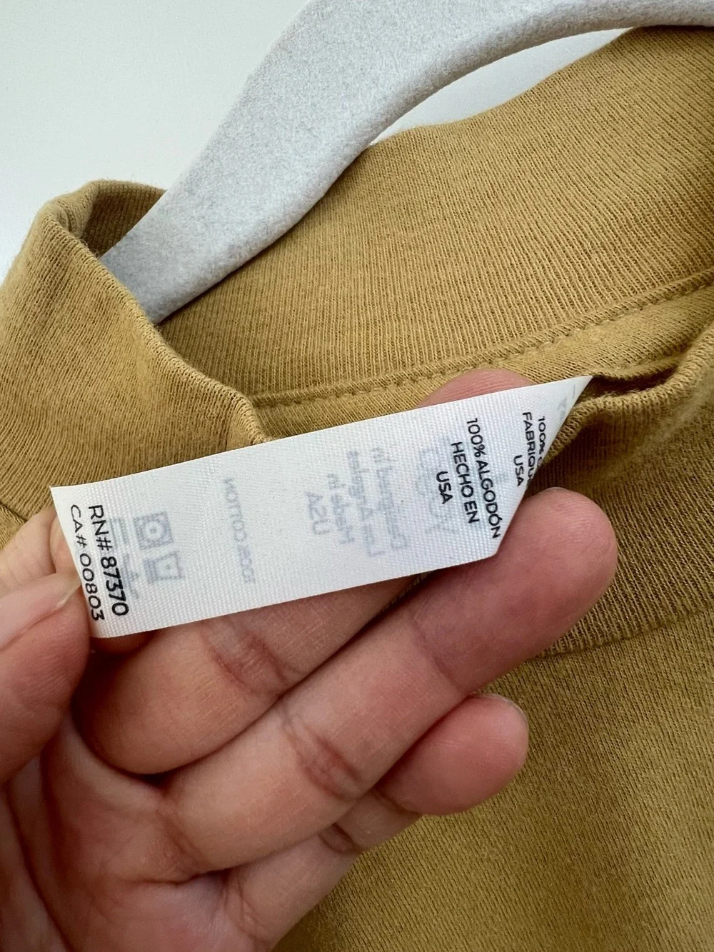 ALO Yoga Cropped Mock Neck Top in Camel Brown